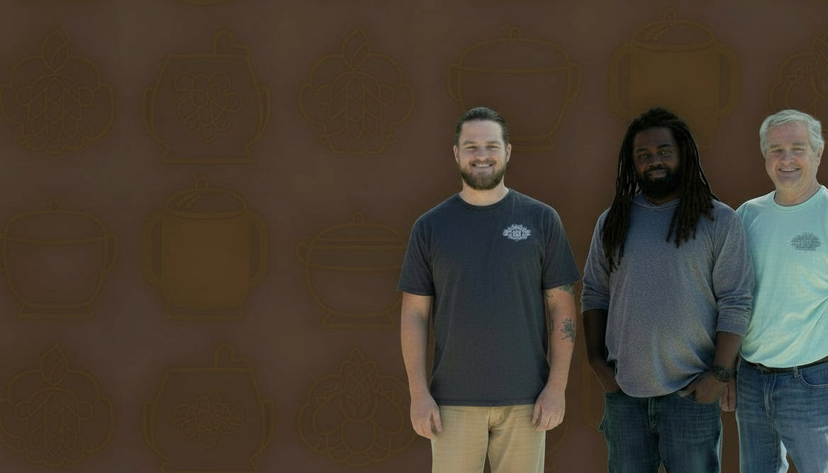 Three men standing side by side against a black background